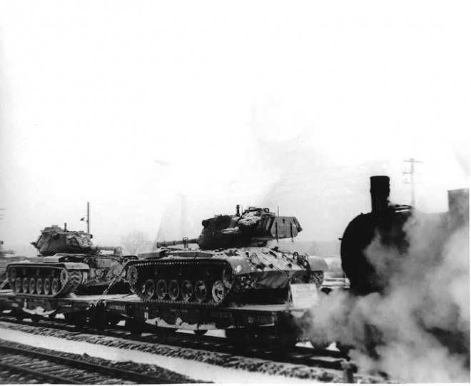 141st Tk Bn Tanks on flat cars.jpg